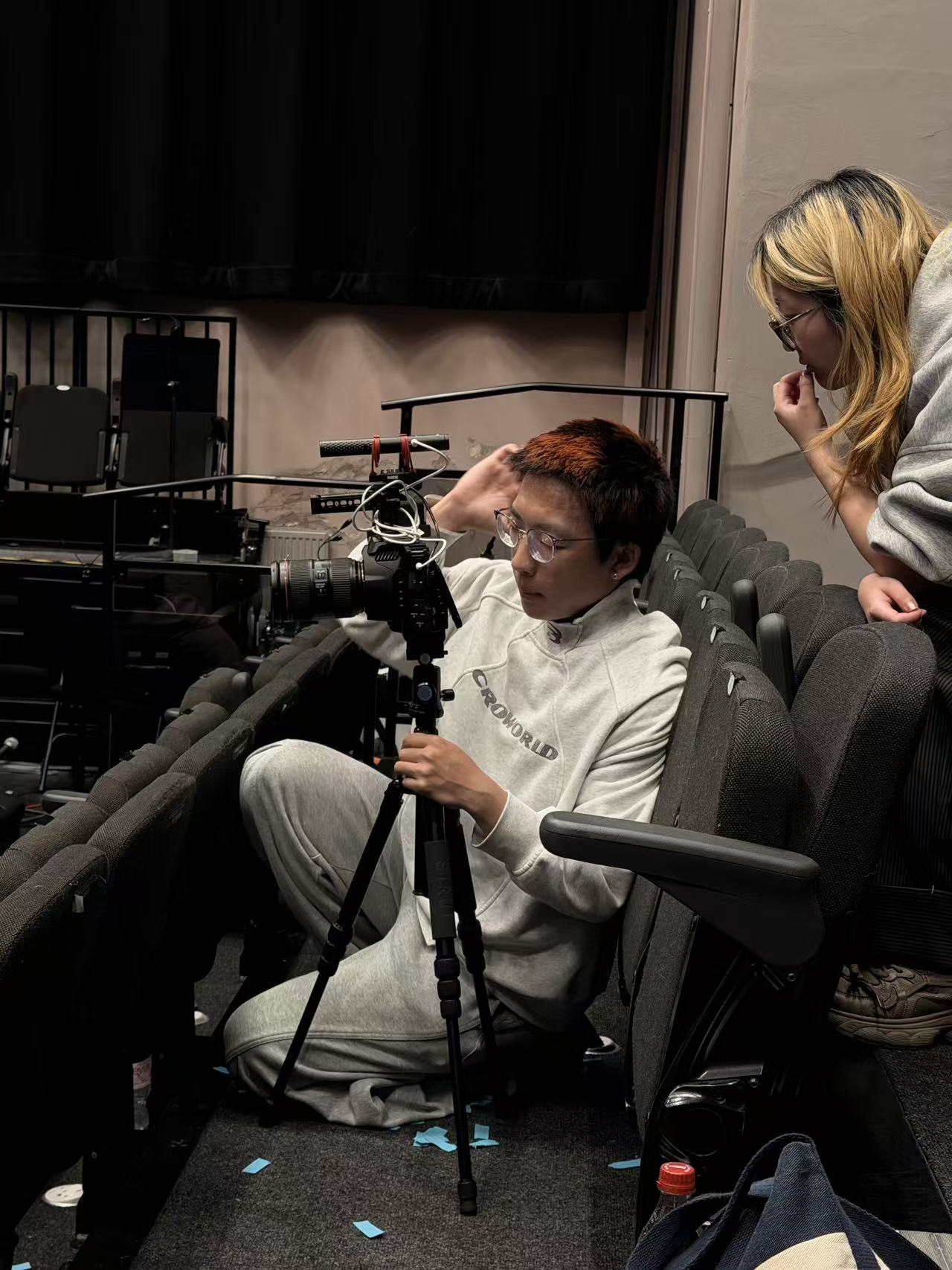 Kehan Joe Wu operating a camera on set
